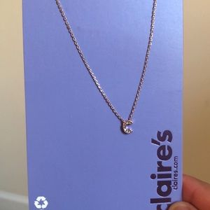 Claire’s letter necklace